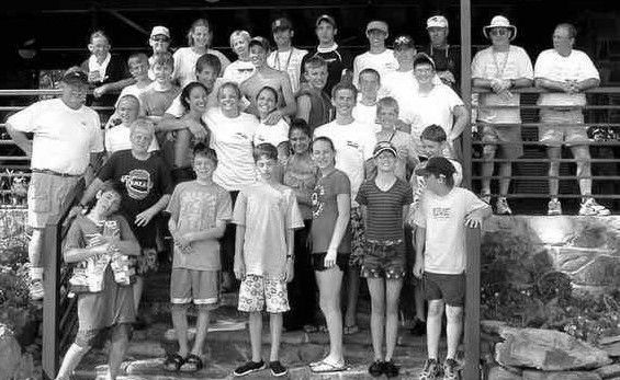 Training class, 28 students, black and white, on the steps of the club house, looks like year book photo
